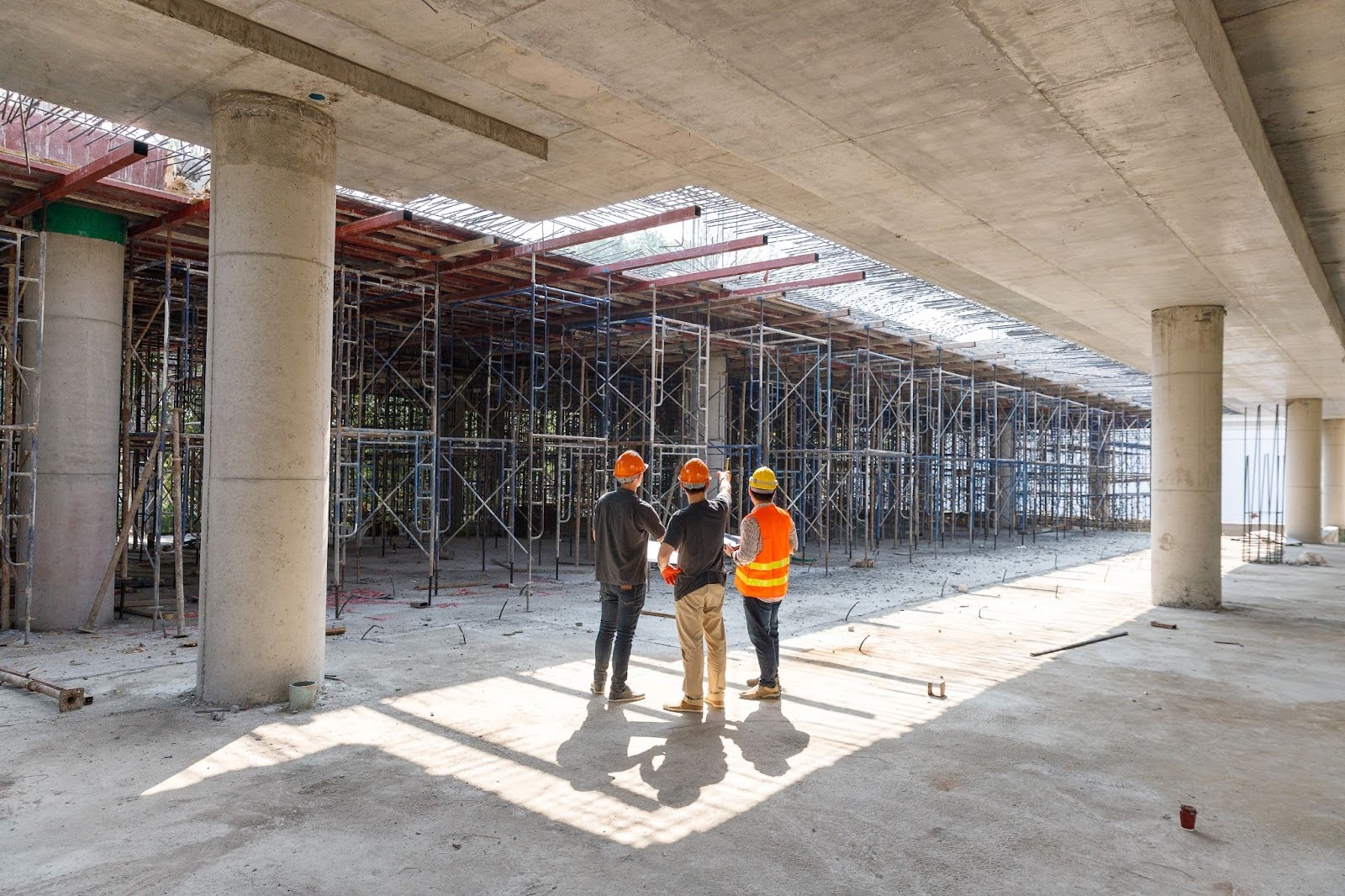 Two workers at a construction site.